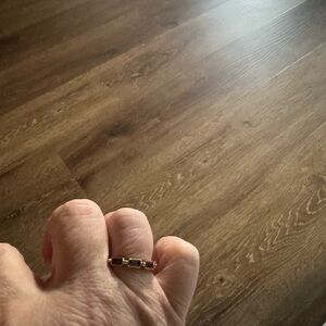 Elegant Gold and Black Ring